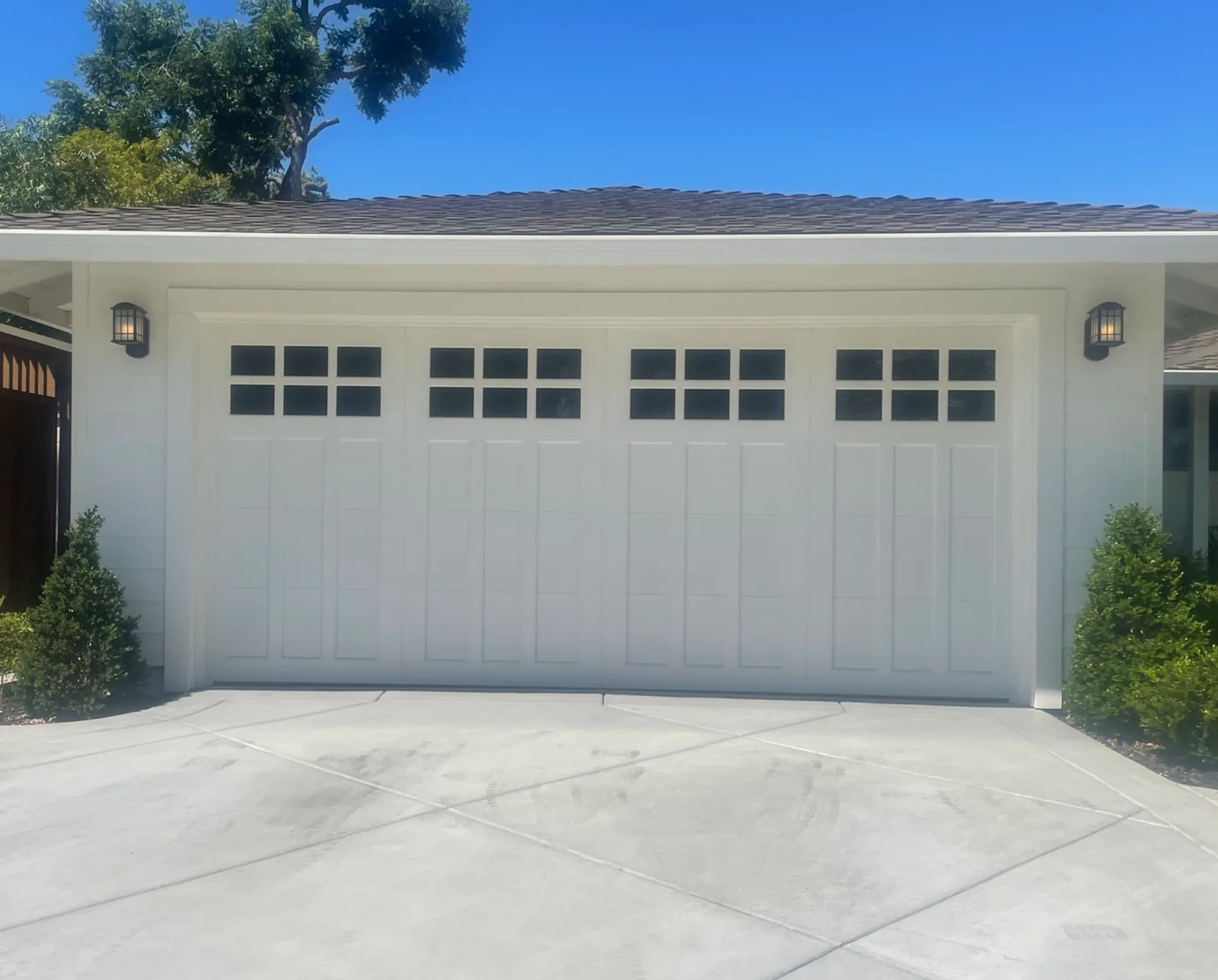 Garage door repair at a brick home in Parker, CO