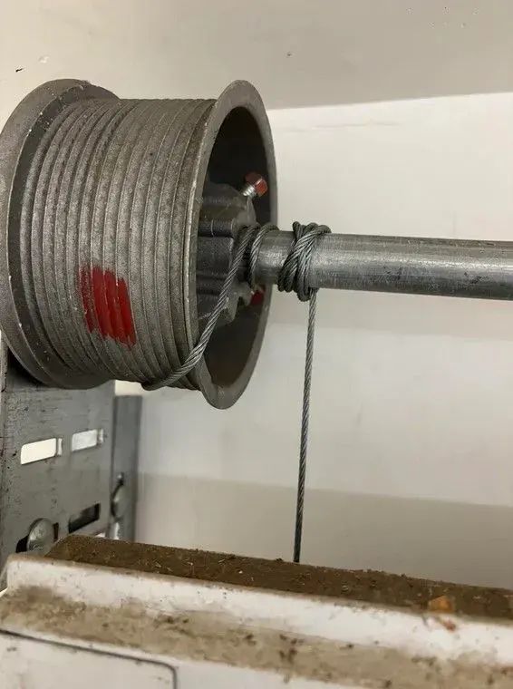Garage door roller in the metal track