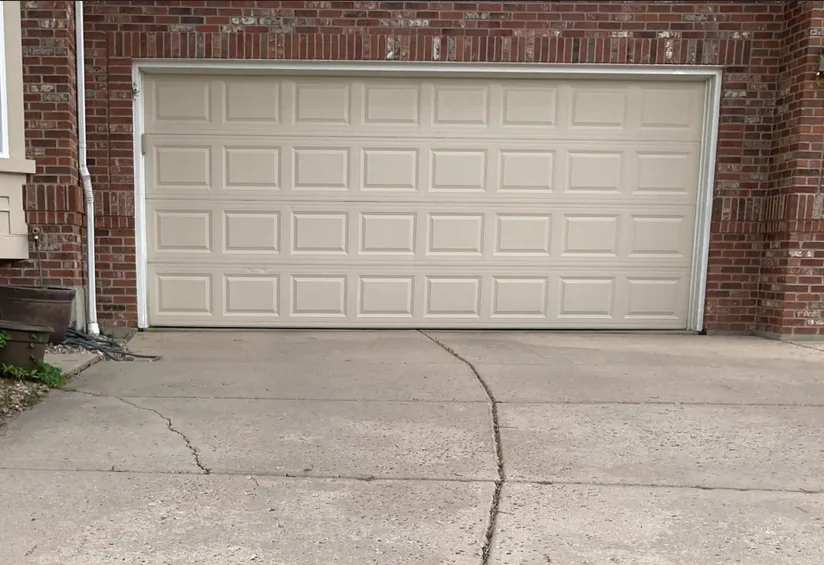 Garage door installation Adams County cream raised-panel double and single garage doors