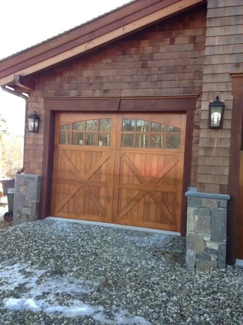 Garage door installation Denver custom stained-wood carriage-house garage door