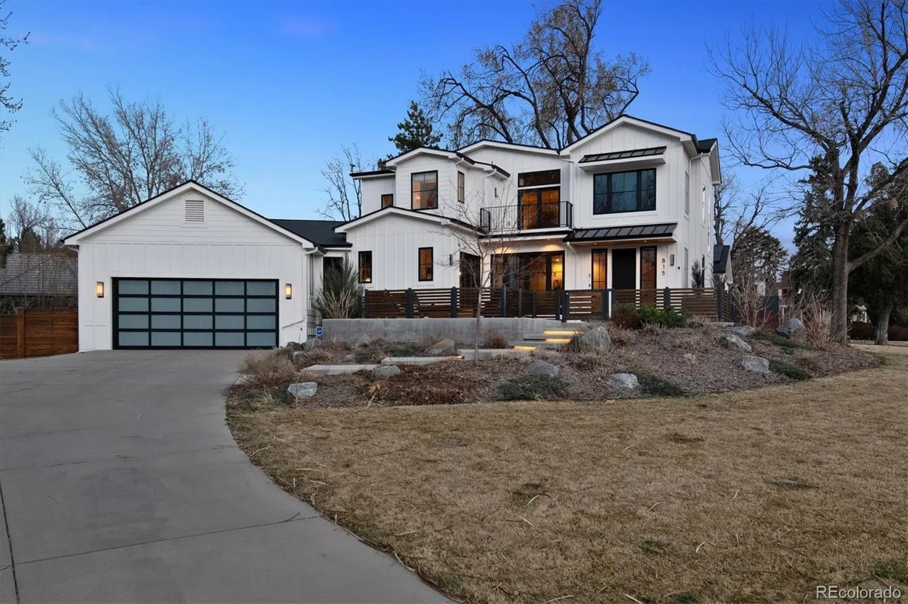 Modern black glass garage door in Denver, CO
