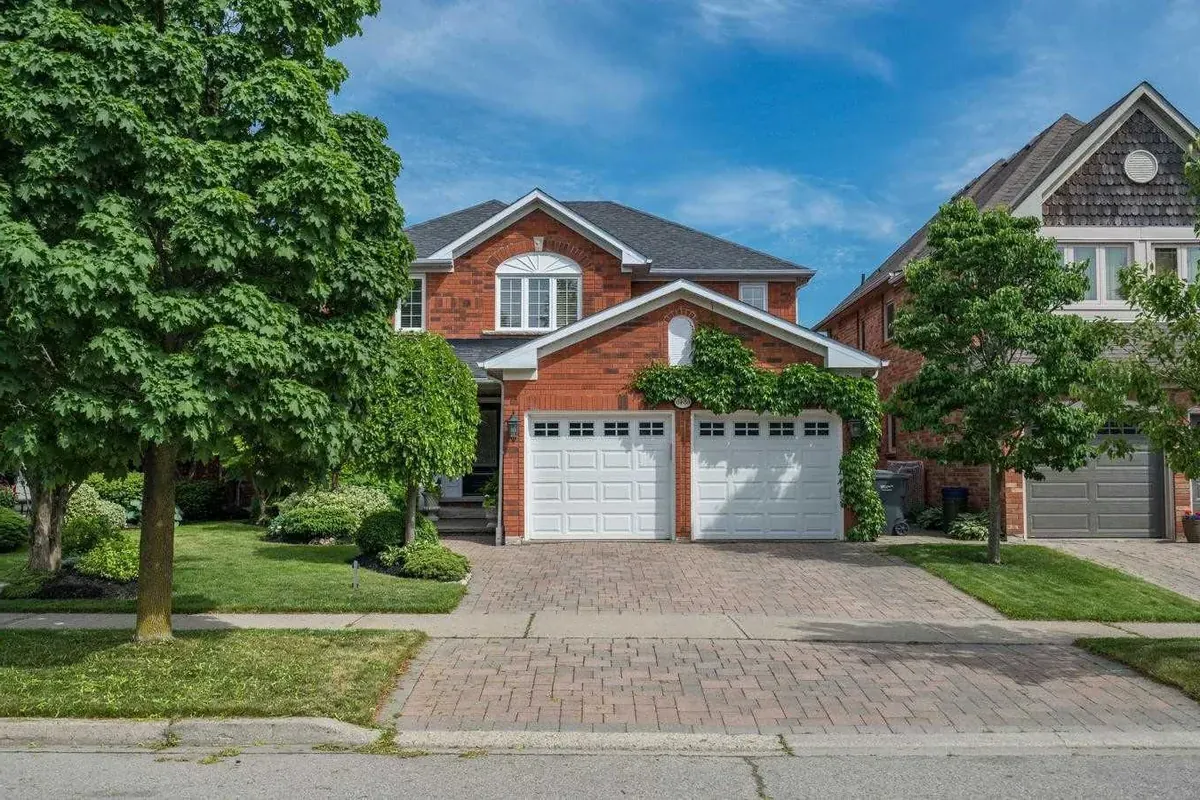Traditional raised-panel single garage doors in Littleton