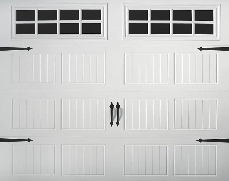 Garage door installation Lone Tree technician installing a wood-look garage door