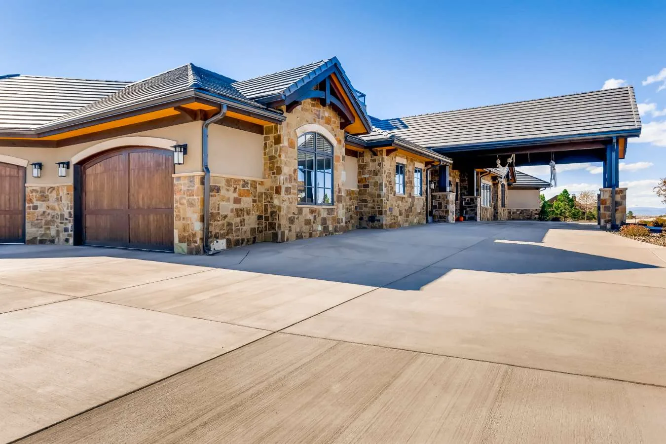 Garage door installation Lone Tree custom wood arched carriage garage door