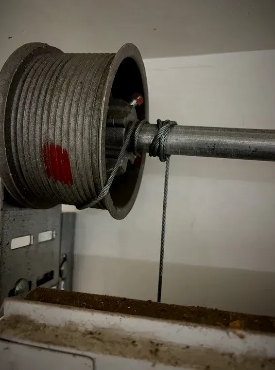 Garage door track alignment and cable replacement in Aurora, Colorado