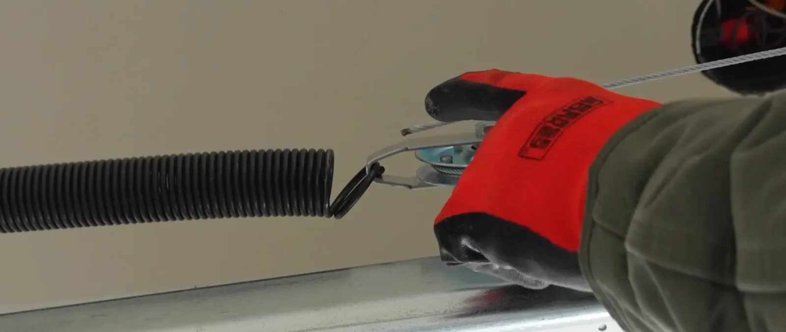Garage door extension spring repair in Littleton