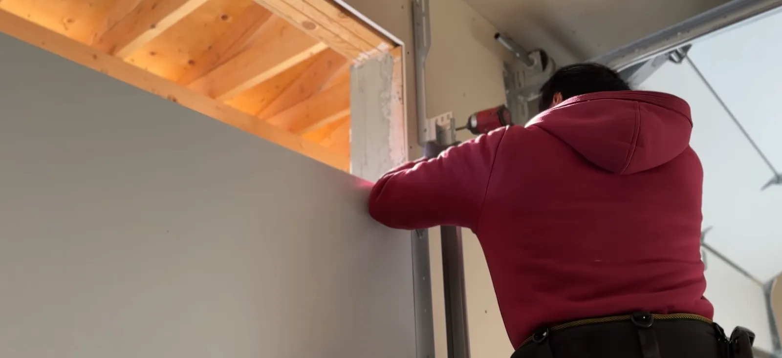 Garage door track repair in Littleton