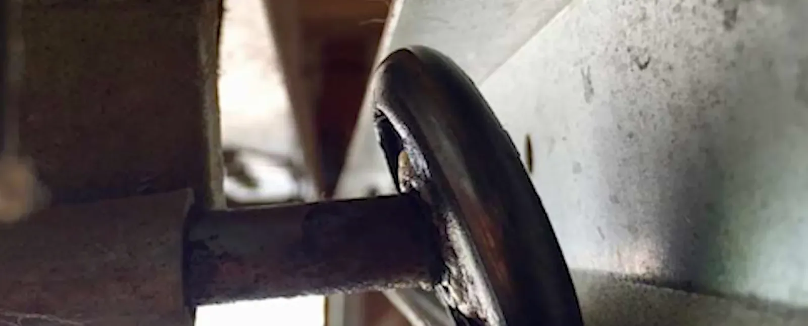Worn garage door roller