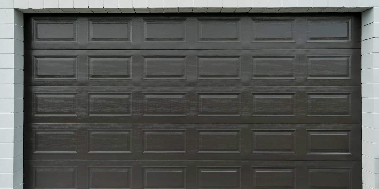 Dark raised-panel replacement double garage door in Parker
